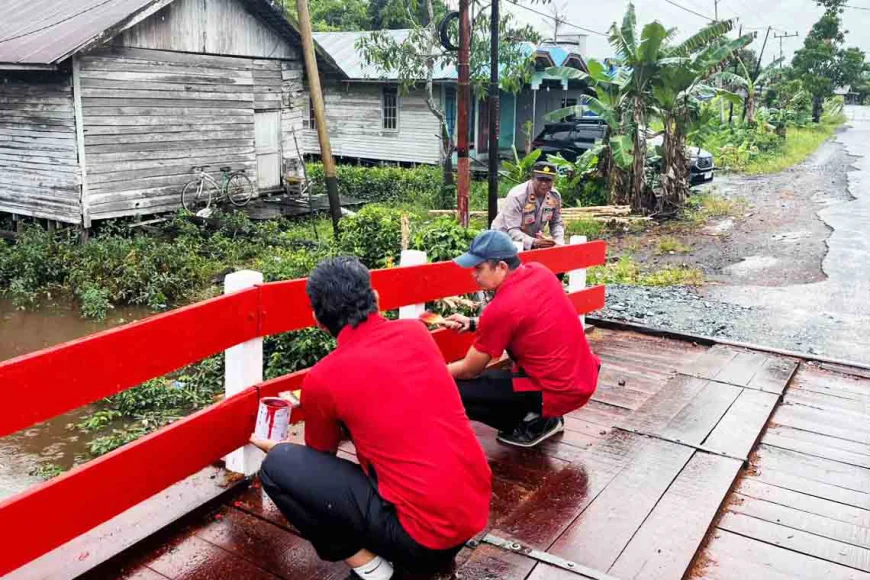 Kolaborasi Polres Batola dan Warga, Jembatan Merah Putih di Barambai Tuntas 100 Persen