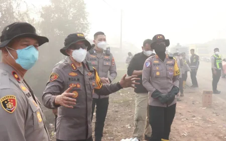 Polres Batola dan Polresta Banjarmasin Kompak Tangani Karhutla di Handil Bakti